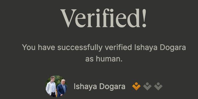 A 'Verified!' confirmation screen stating 'You have successfully verified Ishaya Dogara as human,' with a profile picture showing two people and the name 'Ishaya Dogara' with diamond/crown icons.