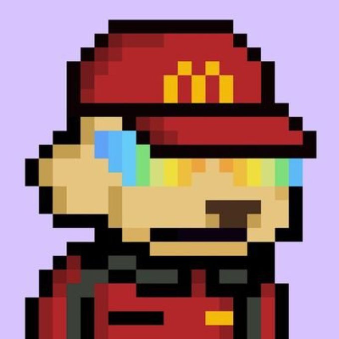 A pixel art portrait of a character wearing a red cap and uniform with yellow accents.