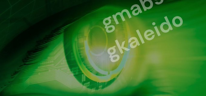 A close-up of a green eye features circuit board patterns overlaid on the iris, accompanied by the text 'gmabs' and 'gkaleido'.