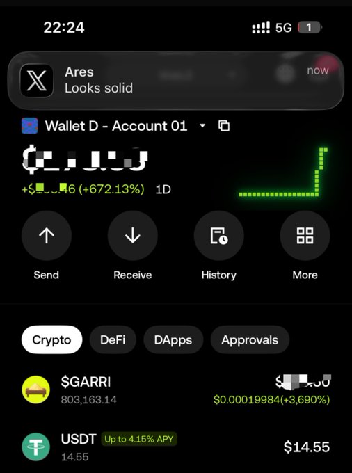 Mobile screenshot of a crypto wallet app showing Wallet D with holdings including $GARRI (+3.69%) and USDT ($14.55), plus a notification from Ares saying 'Looks solid'.