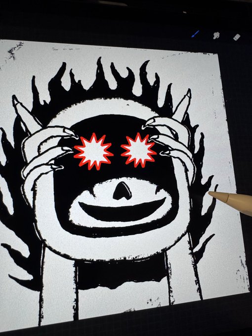 A digital drawing in progress on a screen showing a stylized skull-like character with red star-shaped eyes being touched by skeletal hands, surrounded by flame motifs, while a stylus hovers nearby.