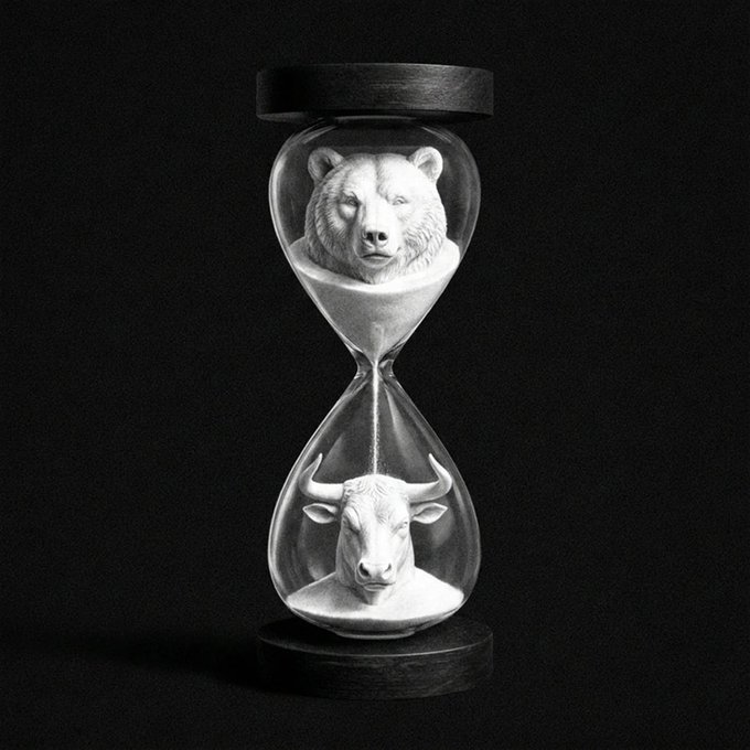 A black and white image depicts an hourglass where the top chamber contains a bear's head emerging from sand, and the bottom chamber contains a bull's head, symbolizing market trends.