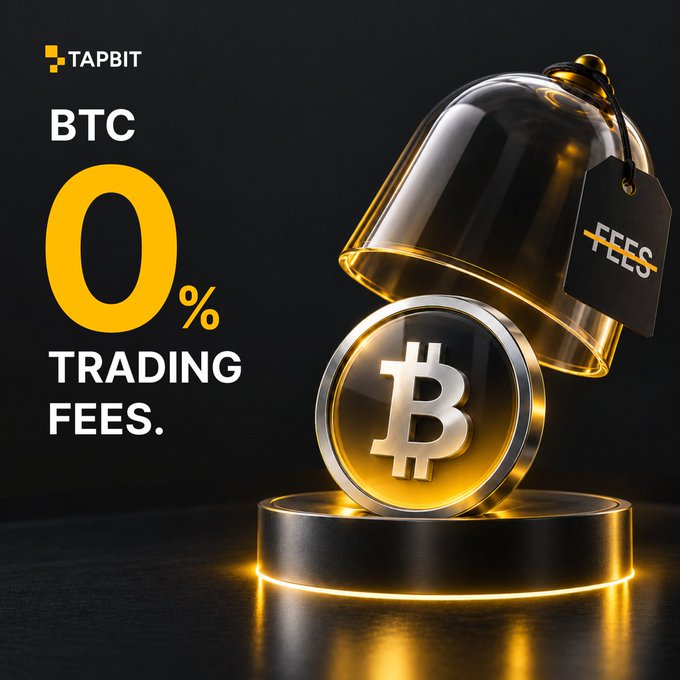 A promotional advertisement for TAPBIT highlighting 'BTC 0% TRADING FEES' with a golden Bitcoin coin and a glass dome with a 'FEES' tag crossed out.