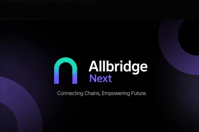 The image displays the "Allbridge Next" logo with a stylized gradient "n" symbol in teal and purple, accompanied by the tagline "Connecting Chains, Empowering Future" set against a dark background with subtle purple circular accents. This branding graphic visually reinforces the post's reference to Allbridge and its role as a cross-chain bridging platform, highlighting the project's identity while the post celebrates its July performance metrics including $42M bridged volume and 5,100+ transactions.