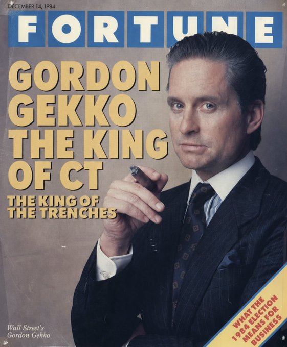 The image is a fictional Fortune magazine cover from December 14, 1984, featuring Michael Douglas as Gordon Gekko from "Wall Street," holding a cigar and smoking a cigarette, with headlines like "GORDON GEKKO THE KING OF CT" and "THE KING OF THE TRENCHES." The caption reinforces the post's tongue-in-cheek framing of Gekko as a legendary meme trader in crypto "trenches," aligning his iconic status as a ruthless Wall Street operator with the "king of the trenches" meme persona referenced in the text.