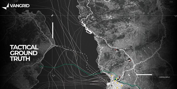 A grayscale satellite map graphic labeled 'VANGRID' and 'TACTICAL GROUND TRUTH' showing a coastal region with various tactical lines, markers, and naval positions.