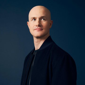 Coinbase CEO Brian Armstrong, pictured in a professional headshot against a dark teal background, shares his perspective on AI's role in cybersecurity, arguing that the technology empowers defenders by enabling comprehensive code scanning before production deployment.