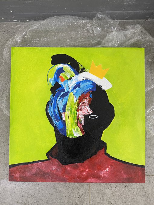 A painting on a bright green square canvas depicting a figure with a black silhouette, colorful abstract face, red garment, and a yellow crown.