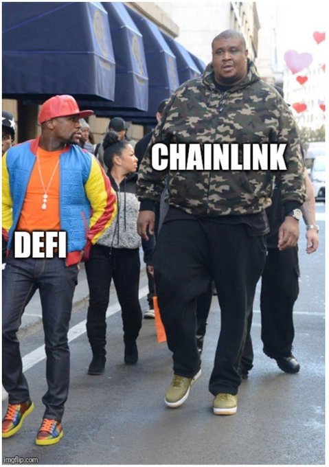 A meme showing Tyler, the Creator, as "DeFi" looking impressed, walking alongside a large man labeled "Chainlink," with hearts floating around the Chainlink figure—visually representing the post's claim that DeFi couldn't succeed at scale until Chainlink solved the ETH/USD price oracle manipulation problem, making it the hero that won DeFi's admiration.