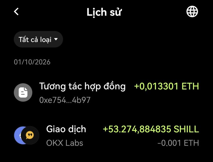 A cryptocurrency transaction history screen in Vietnamese ("LICH'S") showing a contract interaction receiving +0.013301 ETH and a transaction from OKX Labs receiving +53,274.884835 SHILL tokens dated 01/10/2026.