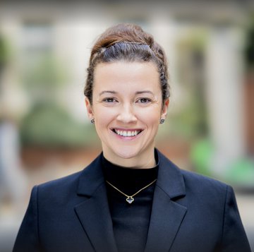 Cassie Craddock, Managing Director for UK & Europe at Ripple, is shown smiling in a professional headshot wearing a dark blazer and black top, paired with the post highlighting her commentary on expanding Ripple's licensed crypto-asset services across Europe under the #CASP framework.