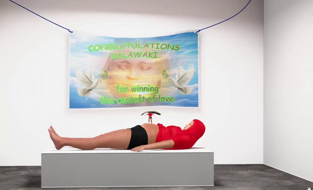 The image features an art installation of a person lying down, wearing a red hoodie with white text that says "Winning The Contest Of Love" against a blue banner. A red fire extinguisher is also present in the scene.