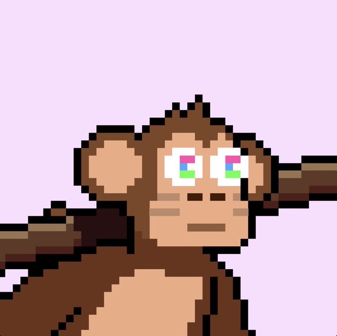 A pixel art illustration depicts a brown monkey character with large, glowing pink and green eyes against a light purple background.