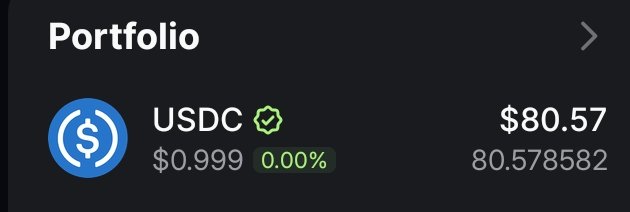 The image shows a cryptocurrency portfolio displaying a USDC balance of $80.57 (80.578582 USDC) at a price of $0.999 with a 0.00% change, suggesting the user has received a stablecoin reward, likely from the giveaway mentioned in the accompanying post.