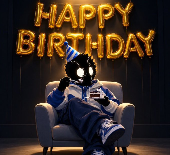 A dark, shadowy figure with glowing white eyes sits in a gray armchair, wearing a blue and white hoodie, matching pants, and a blue party hat while casually eating a slice of birthday cake with a fork, set against a dark wall adorned with large, shiny gold balloon letters spelling "HAPPY BIRTHDAY" that mirror the celebratory tone of the post's milestone reflection on growing older in the web3 community.