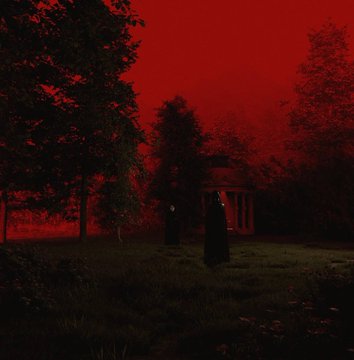 A monochromatic red-tinted landscape photograph showing two dark-clothed figures standing in a shadowy forest clearing near a classical pavilion or gazebo structure, evoking an eerie, dreamlike atmosphere that complements the haunting mood suggested by the post "Hey! I'm Blues & this is my work."