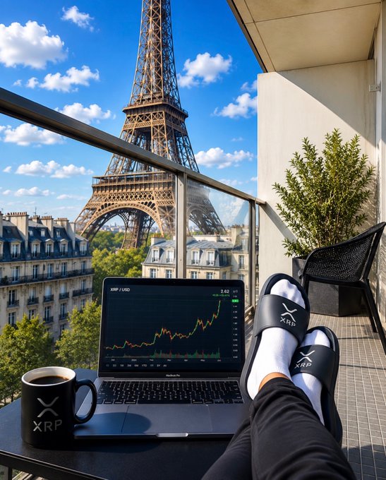 A person relaxes on a Paris balcony overlooking the Eiffel Tower, with a laptop displaying an XRP/USD price chart alongside branded slippers and a coffee mug, visually reinforcing the post's "XRP TAKEOFF" message as the chart shows an upward trend toward takeoff.