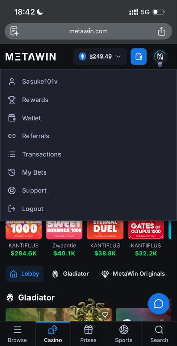 A mobile screenshot of the Metawin.com casino site showing the user's account dashboard with a balance of $249.49, an open sidebar menu (username Sasuke101v, Rewards, Wallet, etc.), and the "Gladiator" game lobby section highlighting featured slots like "Sweet Bonanza 1000" ($284.6K) and "Gates of Olympus 1000" ($32.2K). The image supports the caption by providing visual proof of the user's first Metawin win, with their casino balance and active gameplay lobby visible.