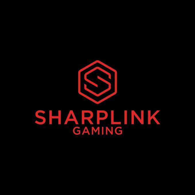 The image displays the SharpLink Gaming logo, featuring a stylized red "S" inside a hexagonal emblem above the company name in bold red text on a black background. The logo relates to the post as SharpLink Gaming is the company whose CEO, Joseph Chalom, made the projection about AI, stablecoins, RWAs, and DeFi potentially generating over $1 trillion in annual financial revenue by 2030.