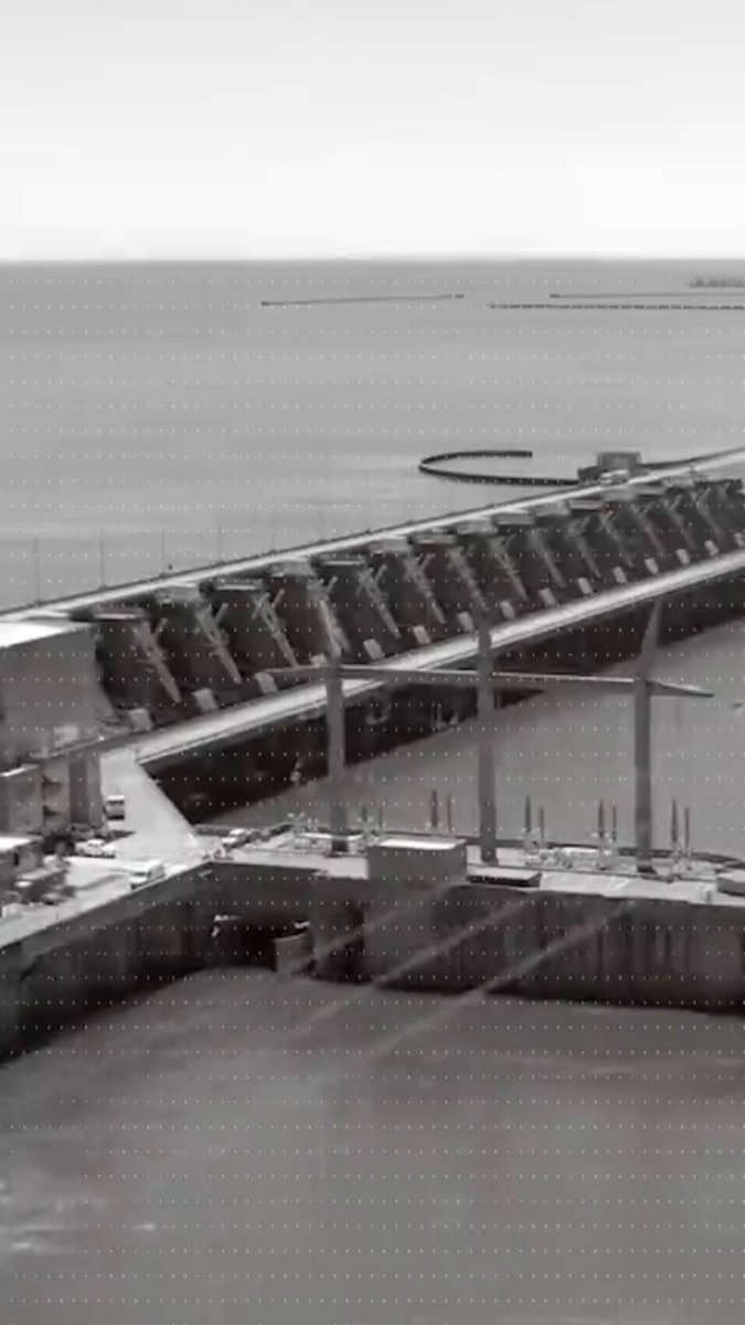 The image shows an aerial view of a dam with multiple levels, situated near the ocean. The dam appears to be under construction or being used for storing water. In addition to the dam, there are several boats visible in the water below. The image also contains text that reads "Institutions are stacking Bitcoin faster than ever Strive just added another 1109 BTC and now holds more than 16500 BTC Theyre treating Bitcoin as a serious long term reserve asset @EverValueCoin takes a different approach Instead of buying Bitcoin they mine it every single". This suggests that the image is related to the cryptocurrency market, specifically Bitcoin.