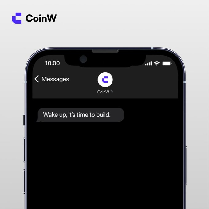 A CoinW branding mockup shows a smartphone displaying a text message notification from "CoinW" that reads "Wake up, it's time to build," visually reinforcing the post's urgency to act on the next crypto opportunity by sharing a UID.