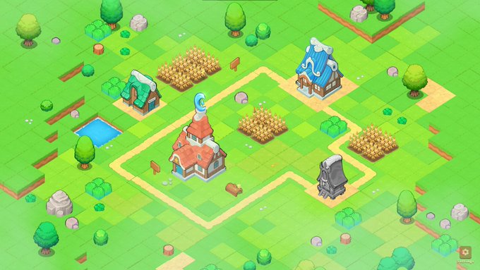 A vibrant isometric view of a whimsical video game world featuring a central cottage with a crescent moon on its roof, surrounded by a maze-like path, wheat fields, a pond, and scattered trees and rocks. The scene visually represents the game's land-plot claiming feature, showcasing the customizable homestead environment where players can build homes for their Axie creatures.