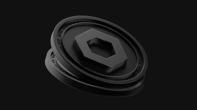 A close-up 3D render of two black coins featuring a hexagonal logo stacked against a dark gray background.