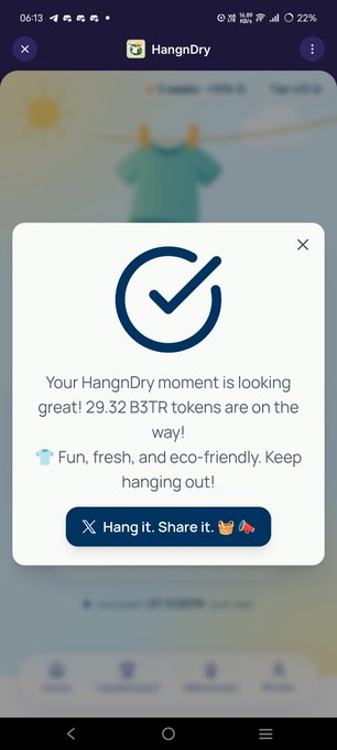 A screenshot from the HangnDry app shows a success popup confirming that 29.32 B3TR tokens have been earned for hanging laundry, with the message 'Your HangnDry moment is looking great!' and a button to share.