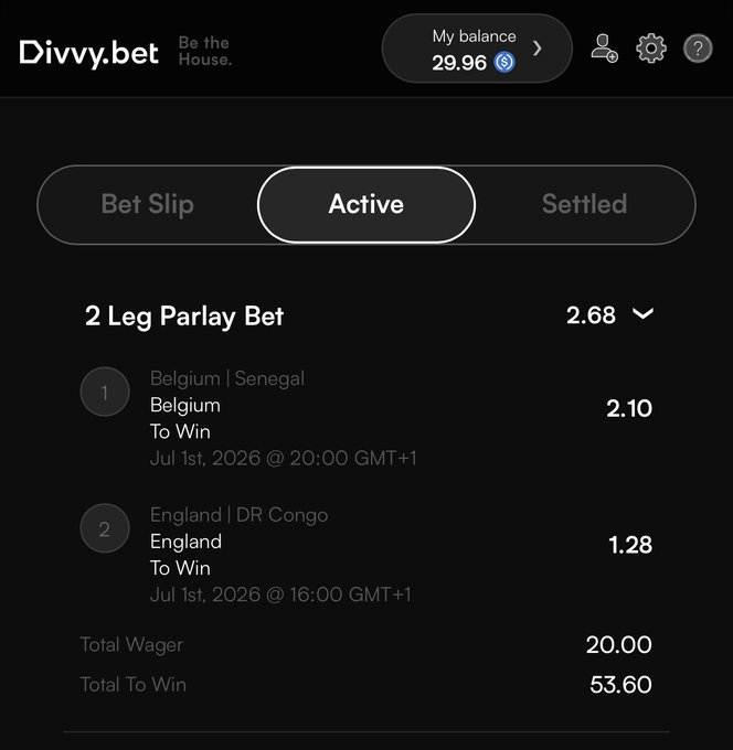 A screenshot of the Divvy.bet betting app displays an active 2 Leg Parlay Bet on a user with a balance of 29.96 SOL, featuring picks for Belgium (2.10 odds) and England (1.28 odds) on July 1st, 2026, with a total wager of 20.00 to win 53.60. The image illustrates the Divvy platform referenced in the post, showcasing active parlay bets as part of the user's combined strategy to generate profits.