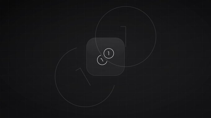 A dark minimalist graphic displaying two interlocking outlined circles on a grid background, with a small icon in the center showing '1' and '\'.