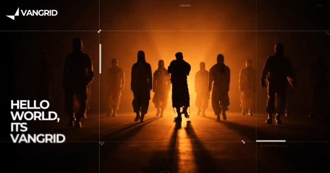 A group of silhouetted figures walk forward through a glowing orange, fog-filled environment, branded with "VANGRID" in the top left and "HELLO WORLD, ITS VANGRID" text on the left side. The dramatic, cinematic imagery suggests a call-to-action style campaign introducing the Vangrid platform, where contributors ("bounty hunters") venture out to capture locations and earn rewards.