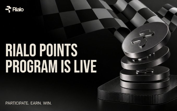 Promotional banner for 'RIALO POINTS PROGRAM IS LIVE' featuring metallic coins and a checkered flag background with the tagline 'PARTICIPATE. EARN. WIN.'