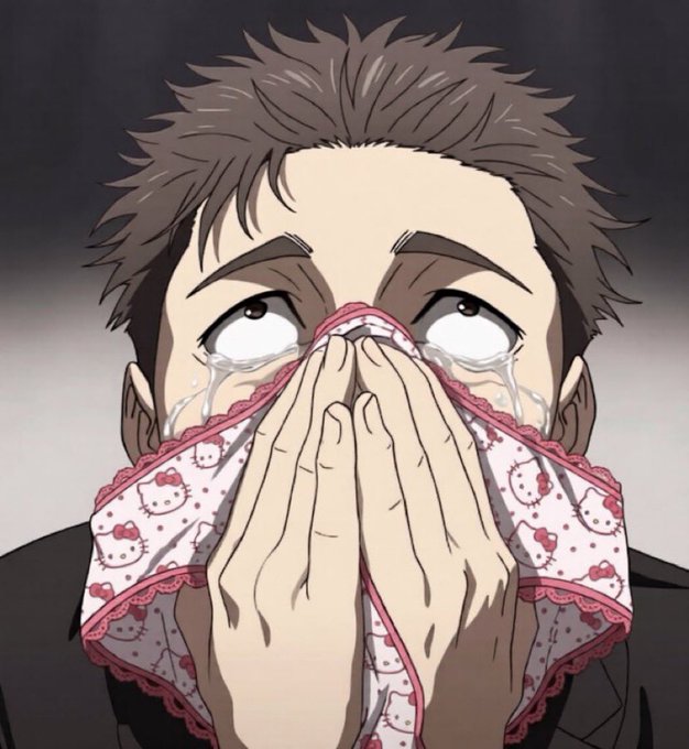 An anime-style illustration shows a man with brown spiky hair crying with wide, bloodshot eyes while holding a pink Hello Kitty handkerchief to his face.