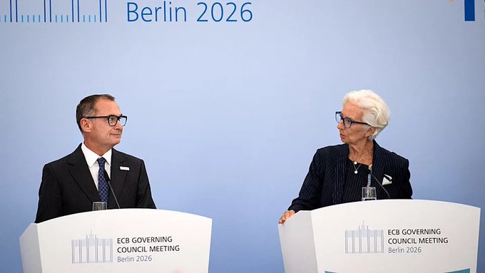 Two individuals stand at podiums labeled 'ECB GOVERNING COUNCIL MEETING Berlin 2026' against a blue backdrop featuring the same text.