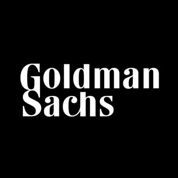 The image displays the "Goldman Sachs" logo in white serif text on a black background. It highlights Goldman Sachs as one of the major financial institutions participating in DTCC's live blockchain trial to bring tokenized assets on-chain.