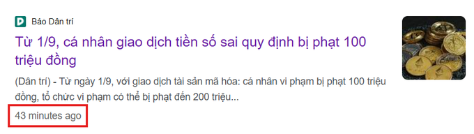 A Vietnamese news article from 'Báo Dân trí' with the headline 'Từ 1/9, cá nhân giao dịch tiền số sai quy định bị phạt 100 triệu đồng', with '43 minutes ago' highlighted in a red box.