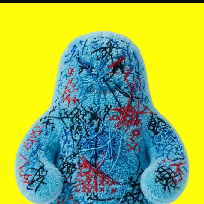 A blue crocheted plush figure covered in messy red, blue, and black stitched threads resembling internal anatomy, set against a bright yellow background.