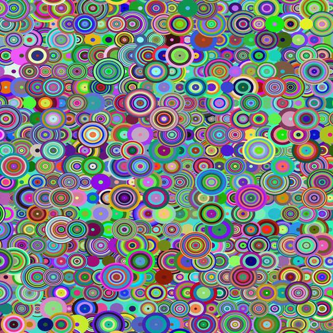 A vibrant abstract pattern composed of densely packed, colorful concentric circles in various sizes.
