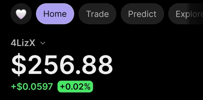 A screenshot from a crypto platform displays the price of 4LizX at $256.88, showing a slight increase of +$0.0597 (+0.02%) in green, with "Home," "Trade," "Predict," and "Explore" tabs at the top. The image relates to the giveaway post by showcasing the current value of the 4LizX token being given away by @4LizX_Web.
