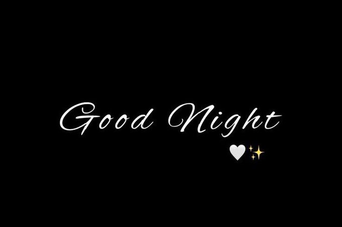 A black screen with the text 'Good Night' in white cursive script, accompanied by a white heart and sparkle emojis.