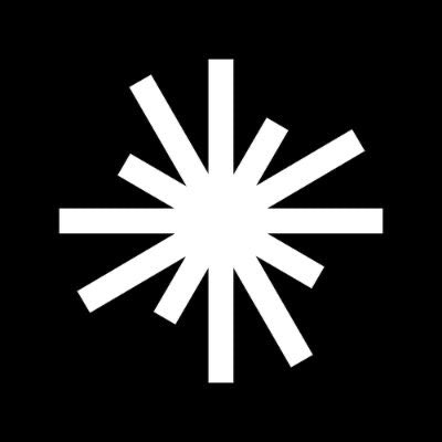 A white asterisk or starburst symbol is displayed against a solid black background, with no visible text, numbers, or tickers. The minimalist icon likely serves as a visual representation or logo for Axis Robotics, aligning with the accompanying announcement of the $AXIS token debut.