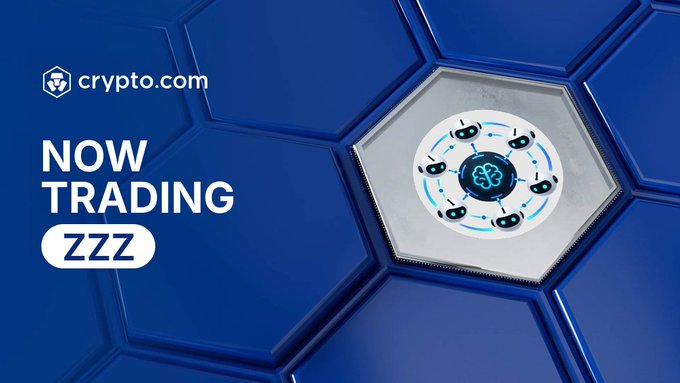 A Crypto.com promotional graphic announcing that ZZZ is "NOW TRADING," set against a blue hexagonal background with the Crypto.com logo. The image relates to the post by highlighting the listing of ZZZ (a Robinhood-related coin) on Crypto.com's spot market at a low market cap.