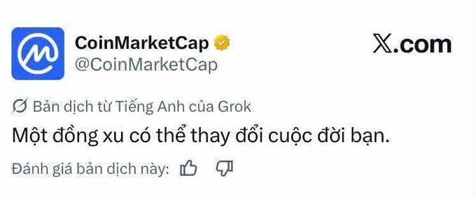 A Vietnamese-language tweet from the verified CoinMarketCap account (@CoinMarketCap), translated by Grok, reads: "Một đồng xu có thể thay đổi cuộc đời bạn." ("A coin can change your life.") The accompanying post asks the community to guess which cryptocurrency is being hinted at.