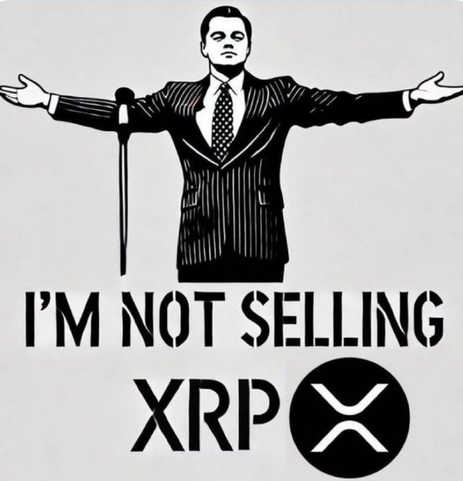 A stylized black-and-white graphic featuring a man in a pinstripe suit with arms outstretched, with text reading 'I'M NOT SELLING XRP' alongside the XRP cryptocurrency logo.