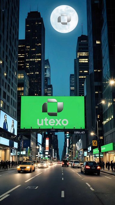 A nighttime cityscape resembling Times Square with a large green billboard displaying a logo and the text "utexo," with the same logo projected onto a full moon above the skyscrapers.