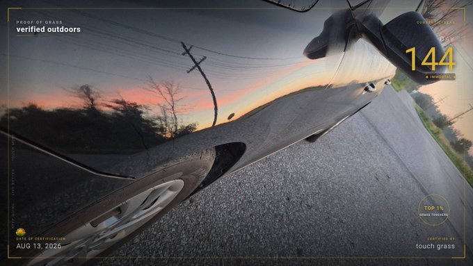 A scenic dashcam/POV view from a moving vehicle at sunset, showing power lines and sky, with overlay text 'PROOF OF GRASS verified outdoors', '144 IN MOTION', 'TOP 1% HUMAN THROTTLE', and 'AUG 13, 2026 touch grass'.