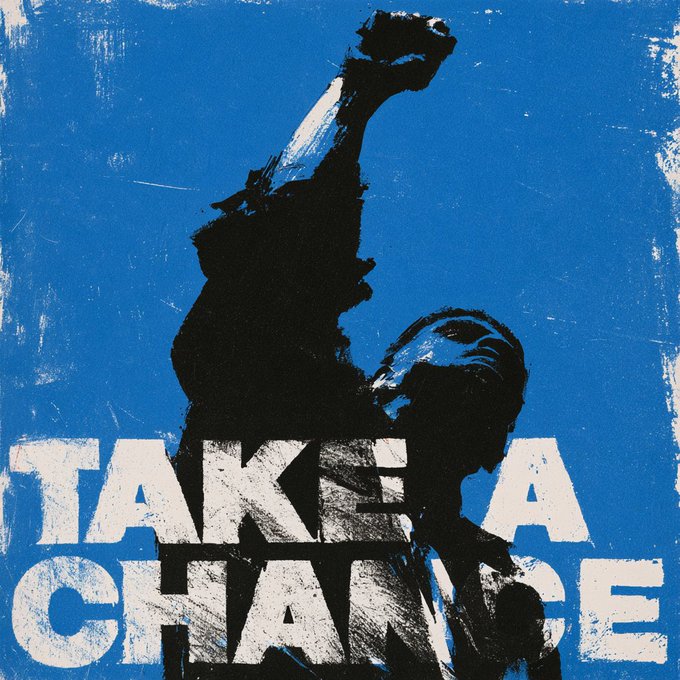 A blue and black stylized poster of a person raising their fist in the air, with the words 'TAKE A CHANCE' in large white block letters.