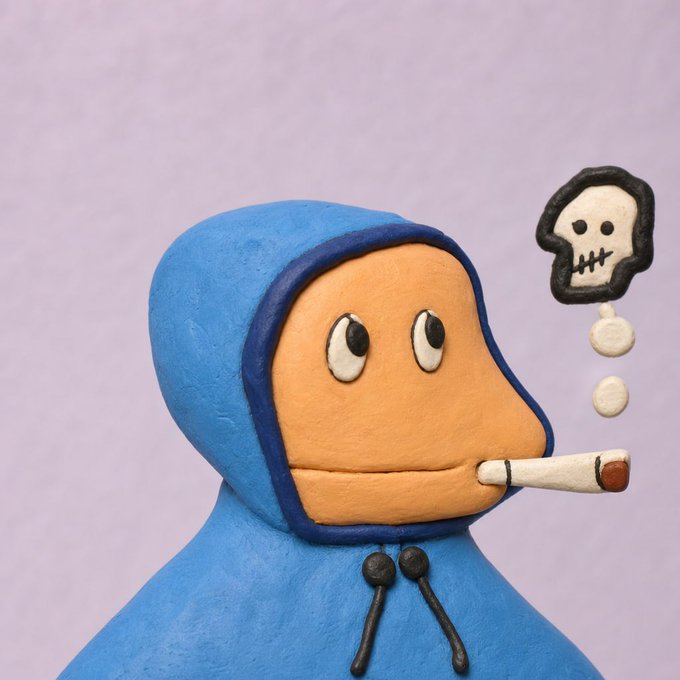 A clay figure in a blue hooded cloak smokes a cigarette, with a skull-shaped smoke cloud floating above against a light purple background.