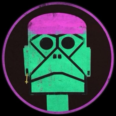 A circular emblem featuring a stylized green skull-like figure with crossed eyes wearing a purple cap against a black background, rendered in a distressed neon aesthetic.