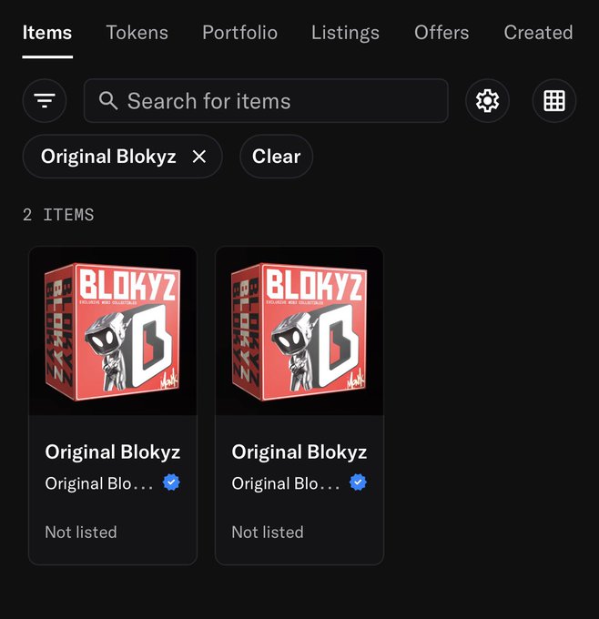 A dark-themed digital interface displays an NFT portfolio showing two identical 'Original Blokyz' items with the text 'Not listed' beneath each.